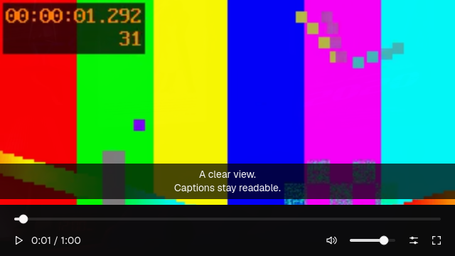 The video player presenting decoded video with the transport controls and an embedded caption